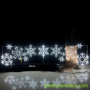 lit street light snowflake display