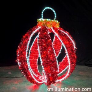 Christmas ball with swirling ribbons